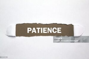 Word Patience on torn paper